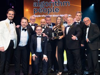 Colin Ferguson, CEO of sponsor The Algorithm People, presents the trophy to Lee Holmes, head of transport operations (centre), Richard Walker, marketing director (far left), and the Wren Kitchens team